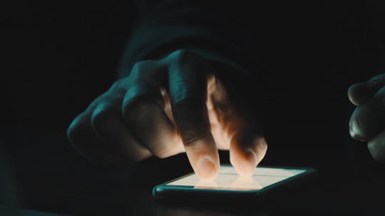 close up of person uses his smartphone at night. low light shot : Stock Photo or Stock Video Download rcfotostock photos, images and assets rcfotostock | RC-Photo-Stock.: