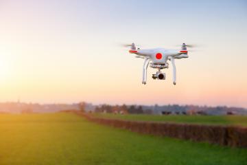 14066103-modern-rc-uav-drone-quadcopter-with-camera-flying-on-a- Stock Photo or Stock Video of rcfotostock | RC Photo Stock