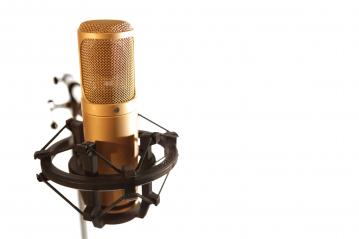 4916116-golden-microphone : Stock Photo or Stock Video Download rcfotostock photos, images and assets rcfotostock | RC Photo Stock.:
