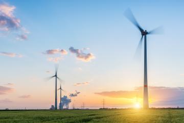 Wind turbines with power plant at sunset with cloudy sky- Stock Photo or Stock Video of rcfotostock | RC Photo Stock