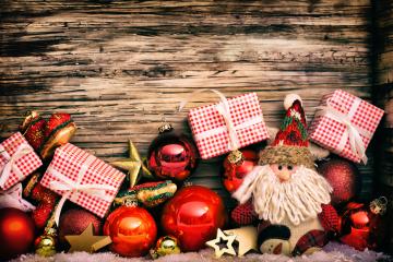 A festive Christmas arrangement with red ornaments, gift boxes, a Santa figurine, and brand tags from BCD Travel, Lufthansa, and Austrian Airlines on a rustic wooden background
 : Stock Photo or Stock Video Download rcfotostock photos, images and assets rcfotostock | RC Photo Stock.: