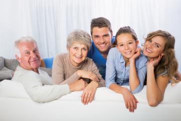 A multi-generational family portrait featuring grandparents, parents, and children bonding together on a couch, expressing warmth, connection, and joy in a bright indoor setting
 : Stock Photo or Stock Video Download rcfotostock photos, images and assets rcfotostock | RC Photo Stock.: