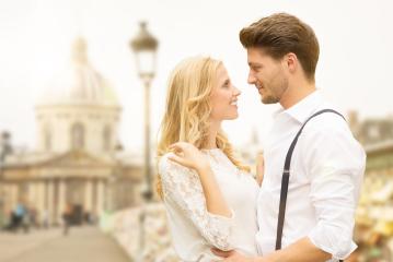 A romantic couple shares a loving gaze on a charming city street with a classic European backdrop, capturing a moment of love, connection, and timeless elegance in an urban setting : Stock Photo or Stock Video Download rcfotostock photos, images and assets rcfotostock | RC Photo Stock.: