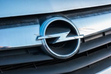 AACHEN, GERMANY FEBRUARY, 2017: Opel sign at a silver car grill. Opel is a German automobile manufacturer headquartered in Germany, subsidiary of the American group General Motors.- Stock Photo or Stock Video of rcfotostock | RC Photo Stock