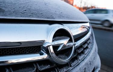 AACHEN, GERMANY JANUARY, 2017: Frozen Opel logo on a car grilll. Opel AG is a German automobile manufacturer. : Stock Photo or Stock Video Download rcfotostock photos, images and assets rcfotostock | RC Photo Stock.: