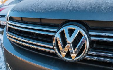 AACHEN, GERMANY JANUARY, 2017: Sign of a Volkswagen logo on a car. Volkswagen is a German car manufacturer headquartered in Wolfsburg, Lower Saxony, Germany- Stock Photo or Stock Video of rcfotostock | RC-Photo-Stock