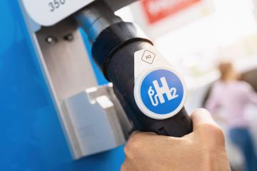 Aachen, Germany, January 2021: Female hold a fuel dispenser with hydrogen on gas station. h2 combustion engine for emission free eco friendly transport. : Stock Photo or Stock Video Download rcfotostock photos, images and assets rcfotostock | RC Photo Stock.: