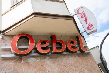 AACHEN, GERMANY JULY 2019:  Oebel bakery Store Logo. Headquartered in Aachen, Oebel is a bakery company since 1918, with bakeries and bakery cafes in Aachen and around NRW.- Stock Photo or Stock Video of rcfotostock | RC-Photo-Stock