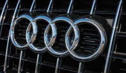 AACHEN, GERMANY MARCH, 2017: Audi emblem on a car grill. Audi is a German automobile manufacturer that designs, engineers, produces, markets and distributes luxury automobiles- Stock Photo or Stock Video of rcfotostock | RC Photo Stock