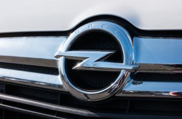 AACHEN, GERMANY MARCH, 2017: Opel logo on a car grilll. Opel AG is a German automobile manufacturer. : Stock Photo or Stock Video Download rcfotostock photos, images and assets rcfotostock | RC Photo Stock.: