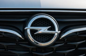 AACHEN, GERMANY MARCH, 2017: Opel logo on a car grilll. Opel AG is a German automobile manufacturer.- Stock Photo or Stock Video of rcfotostock | RC Photo Stock