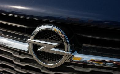 AACHEN, GERMANY MARCH, 2017: Opel logo on a dark blue car. Opel AG is a German automobile manufacturer.- Stock Photo or Stock Video of rcfotostock | RC Photo Stock