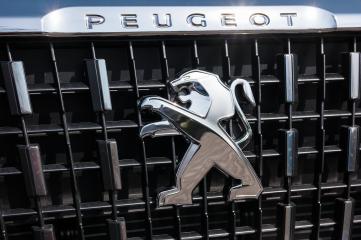 AACHEN, GERMANY MARCH, 2017: Peugeot logo sign on a car grill. Peugeot is a French cars brand, part of PSA Peugeot Citroen.- Stock Photo or Stock Video of rcfotostock | RC Photo Stock