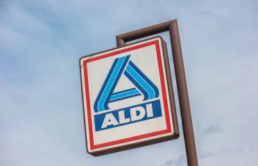 AACHEN, GERMANY OCTOBER, 2017: Aldi sign (north division) against blue sky. The German-based discount supermarket chain currently operates over 10,000 stores in 18 countries.- Stock Photo or Stock Video of rcfotostock | RC-Photo-Stock
