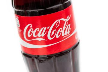 AACHEN, GERMANY OCTOBER, 2017: Close-up of a Classic glass bottle Coca-Cola isolated on white background. Coca-Cola is a carbonated non-alcoholic beverage sold all over the world.- Stock Photo or Stock Video of rcfotostock | RC-Photo-Stock