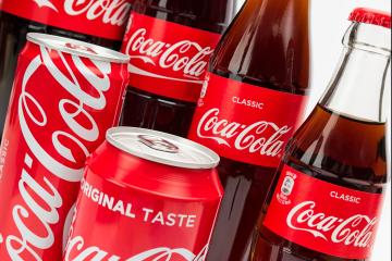 AACHEN, GERMANY OCTOBER, 2017: Several Coca-Cola glass bottles and Cans. Coca-Cola is a carbonated soft drink sold in stores, throughout the world.- Stock Photo or Stock Video of rcfotostock | RC-Photo-Stock
