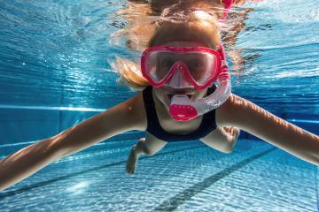 active kid in snorkeling mask dive underwater for swimming lessons  in swimming pool.- Stock Photo or Stock Video of rcfotostock | RC Photo Stock