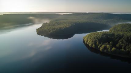 Aerial view of a misty lake at dawn
 : Stock Photo or Stock Video Download rcfotostock photos, images and assets rcfotostock | RC Photo Stock.: