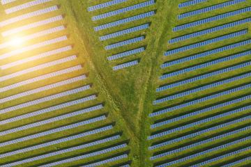 Aerial view of solar power plant. Solar farm system from above. Large photovoltaic power station. Source of ecological renewable energy. - Stock Photo or Stock Video of rcfotostock | RC Photo Stock