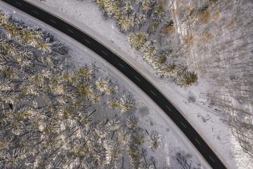 Aerial view of winter road in snowy forest. Drone captured shot from above- Stock Photo or Stock Video of rcfotostock | RC Photo Stock