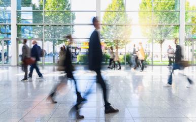 Anonymous blurred business people rush through trade fair hall or airport- Stock Photo or Stock Video of rcfotostock | RC Photo Stock