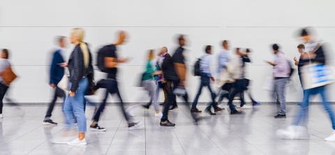 Anonymous blurred crowd on the go at a business trade fair : Stock Photo or Stock Video Download rcfotostock photos, images and assets rcfotostock | RC Photo Stock.: