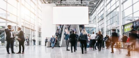 anonymous blurred people rushing at a trade fair - Stock Photo or Stock Video of rcfotostock | RC Photo Stock