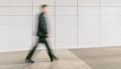 anonymous businessman walking in a floor, including copy space- Stock Photo or Stock Video of rcfotostock | RC Photo Stock