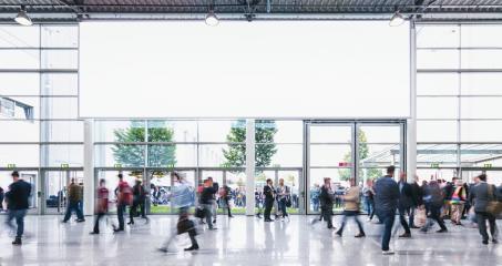 Anonymous Crowd of business people walking at a trade fair - concept image : Stock Photo or Stock Video Download rcfotostock photos, images and assets rcfotostock | RC-Photo-Stock.: