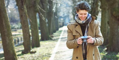 Attractive Tourist taking a photograph with vintage camera- Stock Photo or Stock Video of rcfotostock | RC Photo Stock