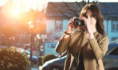 Attractive Tourist taking a photograph with vintage camera : Stock Photo or Stock Video Download rcfotostock photos, images and assets rcfotostock | RC Photo Stock.:
