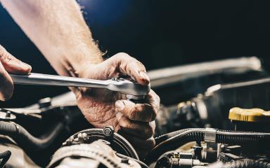 Auto mechanic working on car engine in mechanics garage. Repair service : Stock Photo or Stock Video Download rcfotostock photos, images and assets rcfotostock | RC Photo Stock.: