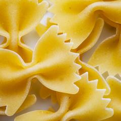 backgorund texture of mini Farfalle pasta noodels- Stock Photo or Stock Video of rcfotostock | RC-Photo-Stock