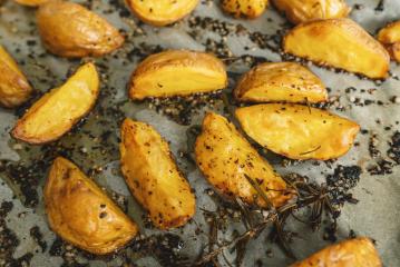Baked potato wedges with rosemary and oil -  homemade organic vegetable vegan vegetarian potato wedges snack food meal.- Stock Photo or Stock Video of rcfotostock | RC-Photo-Stock