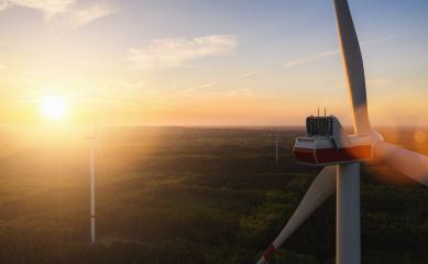 Beautiful sunset above the windmills on the field- Stock Photo or Stock Video of rcfotostock | RC-Photo-Stock