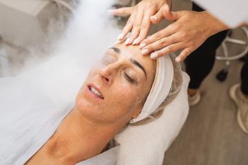 Beauty treatment of a woman with ozone facial steamer and cream massage in the face : Stock Photo or Stock Video Download rcfotostock photos, images and assets rcfotostock | RC Photo Stock.: