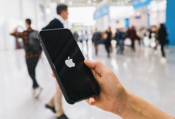 BERLIN, GERMANY AUGUST 2019:   Woman hand holding iphone Xs with logo of apple, produced by Apple Computer, Inc.- Stock Photo or Stock Video of rcfotostock | RC Photo Stock