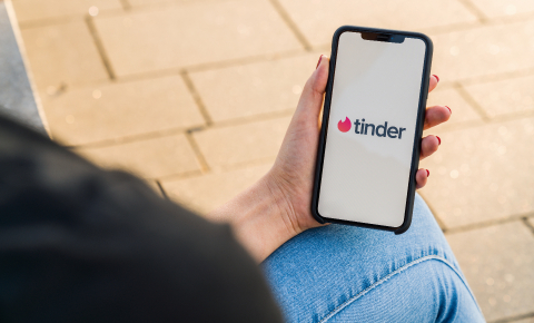 BERLIN, GERMANY AUGUST 2019:  Woman hand holding iphone Xs with logo of Tinder app to log in. - Stock Photo or Stock Video of rcfotostock | RC Photo Stock