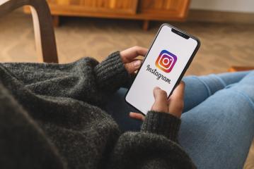 BERLIN, GERMANY AUGUST 2019: Woman hand holding iphone Xs with logo of instagram application. Instagram is largest and most popular photograph social networking.- Stock Photo or Stock Video of rcfotostock | RC Photo Stock