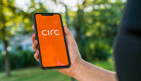 BERLIN, GERMANY AUGUST 2019: Woman hand holding iphone Xs with logo of CIRC app displayed on a smartphone to rent a e-Scooter. Circ is a rental electric scooter company. Quick and easy way to travel- Stock Photo or Stock Video of rcfotostock | RC-Photo-Stock