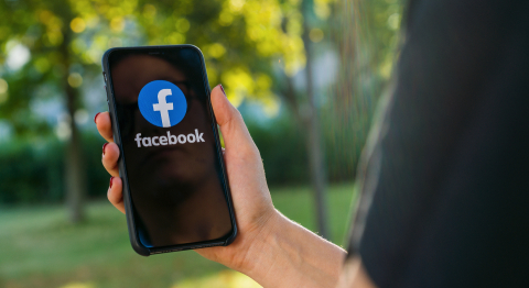 BERLIN, GERMANY AUGUST 2019: Woman hand holding iphone Xs with logo of Facebook application in the park. Facebook is an online social networking service founded in February 2004 by Mark Zuckerberg.- Stock Photo or Stock Video of rcfotostock | RC-Photo-Stock