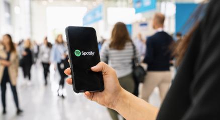 BERLIN, GERMANY JANUARY 2020: Woman holding a iPhone Xs opening spotify app, Spotify is a music service that offers legal streaming music. : Stock Photo or Stock Video Download rcfotostock photos, images and assets rcfotostock | RC Photo Stock.: