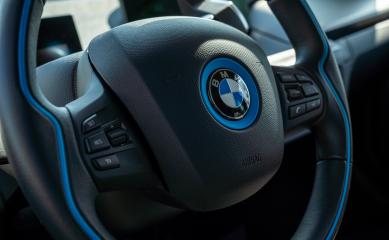 BERLIN, GERMANY JULY 2019: Detail of BMW i3 Electric Car Dashboard and Wheel. BMW i3 is a five-door urban electric car developed by the German manufacturer BMW.- Stock Photo or Stock Video of rcfotostock | RC Photo Stock