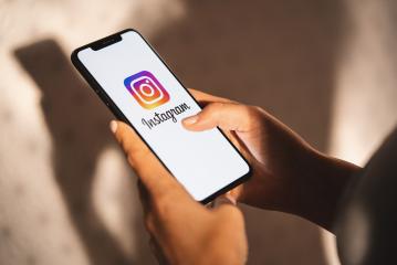 BERLIN, GERMANY JULY 2019: Woman hand holding iphone Xs with logo of instagram application. Instagram is largest and most popular photograph social networking.- Stock Photo or Stock Video of rcfotostock | RC-Photo-Stock