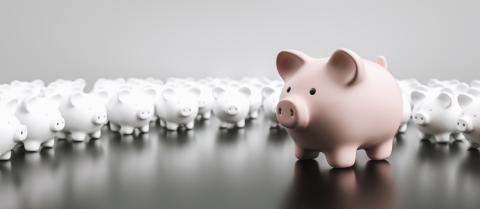 Big piggy bank with small white piggy banks on a table, banner size : Stock Photo or Stock Video Download rcfotostock photos, images and assets rcfotostock | RC-Photo-Stock.: