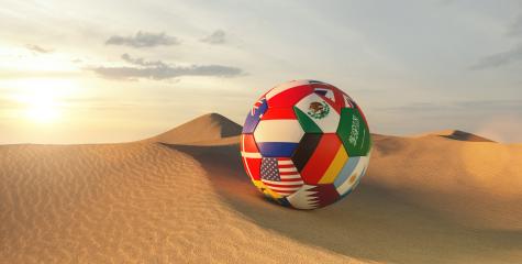 Big soccer ball with many country flags for the World Cup in the desert of Qatar - Stock Photo or Stock Video of rcfotostock | RC Photo Stock