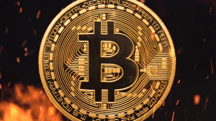 Bitcoin - bit coin BTC cryptocurrency money burning in flames and fire sparkles- Stock Photo or Stock Video of rcfotostock | RC-Photo-Stock