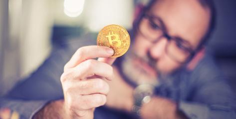 Bitcoin in hand of a businessman- Stock Photo or Stock Video of rcfotostock | RC Photo Stock