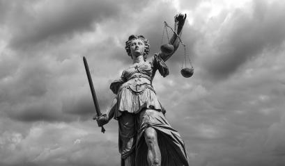 Black and white Statue of justice goddess (Justitia) with cloudy sky background- Stock Photo or Stock Video of rcfotostock | RC-Photo-Stock