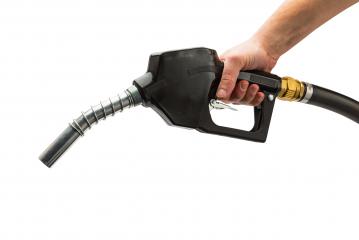 black gas pump nozzle with hand - Stock Photo or Stock Video of rcfotostock | RC-Photo-Stock
